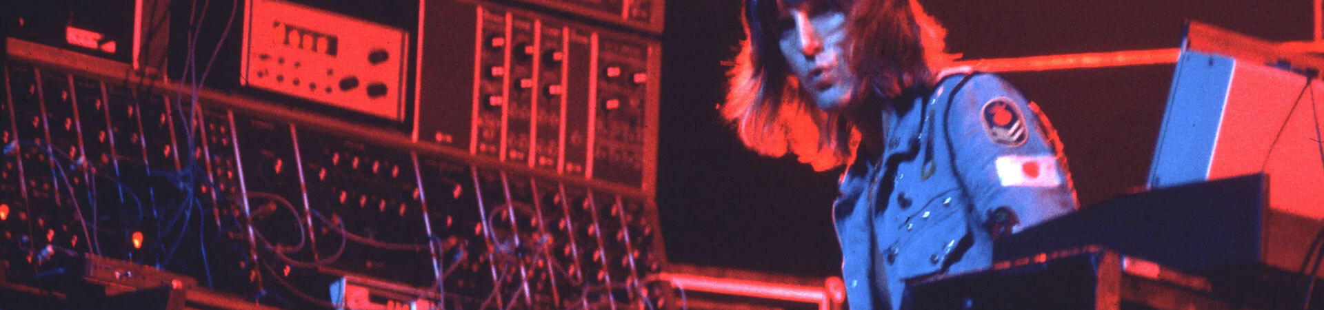 A dude with a lot of synths, like a lot of synths